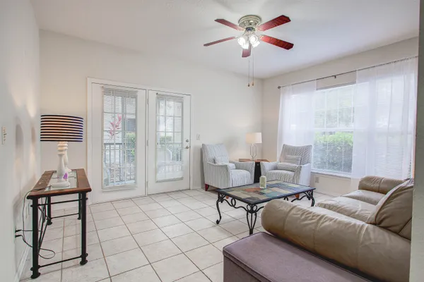 a living room with furniture and a window