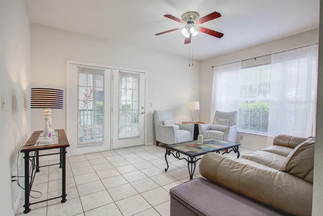 a living room with furniture and a window