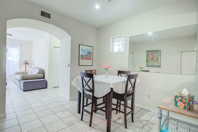 a view of a dining room with furniture