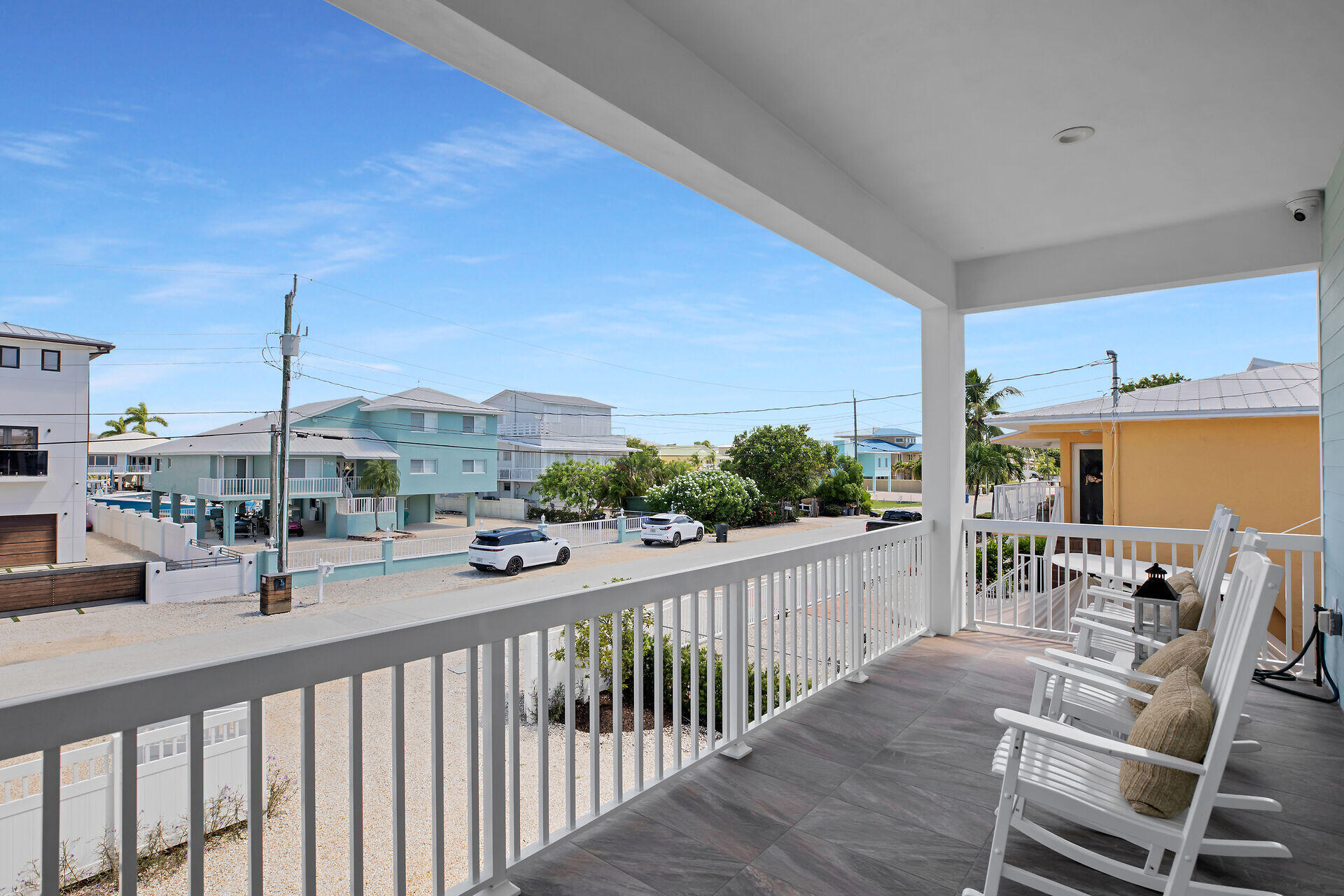 162 Marina Avenue Key Largo, FL 33037 - Photo 12 of 53 a view of a balcony and chairs