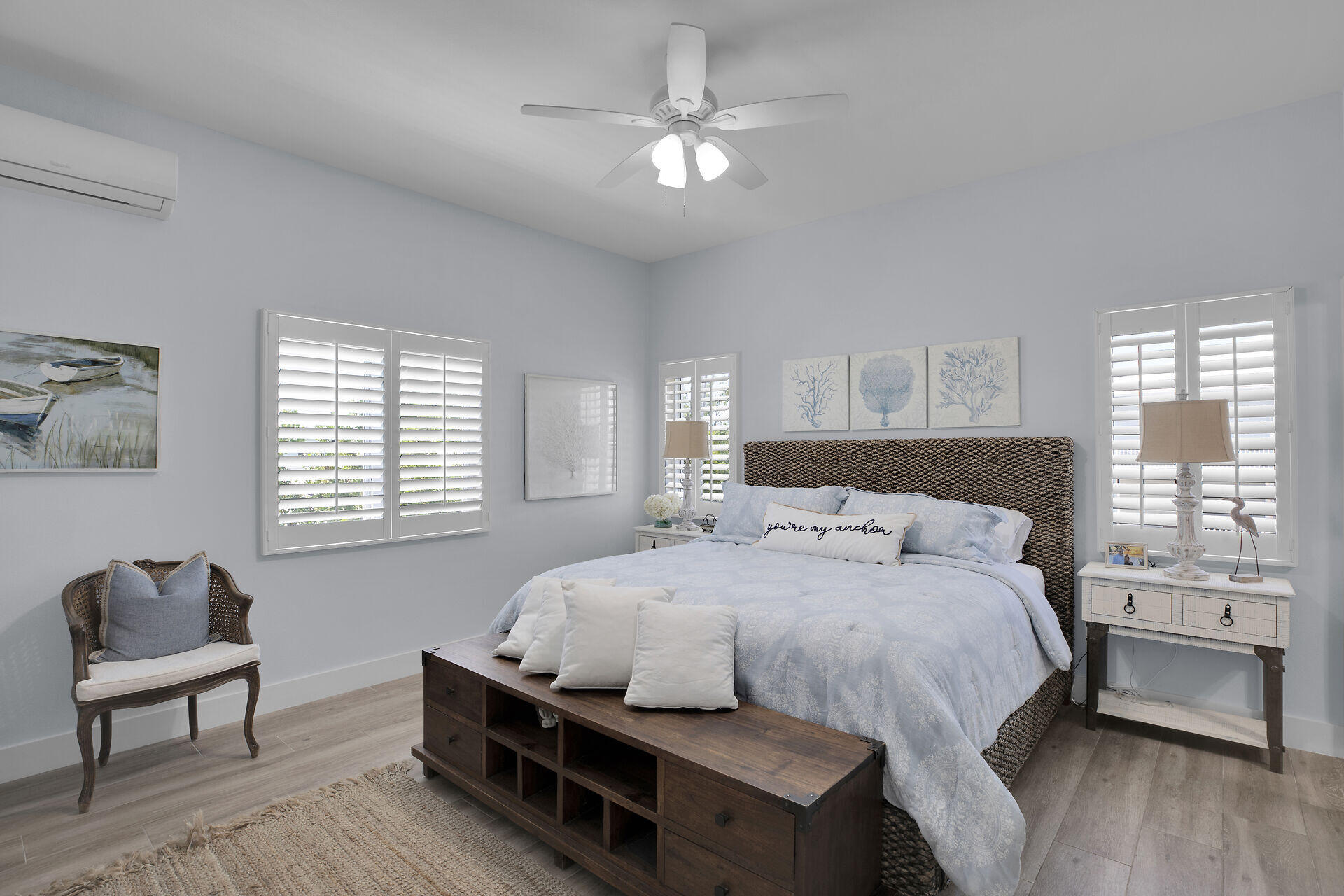 162 Marina Avenue Key Largo, FL 33037 - Photo 23 of 53 a bedroom with a bed and a chair