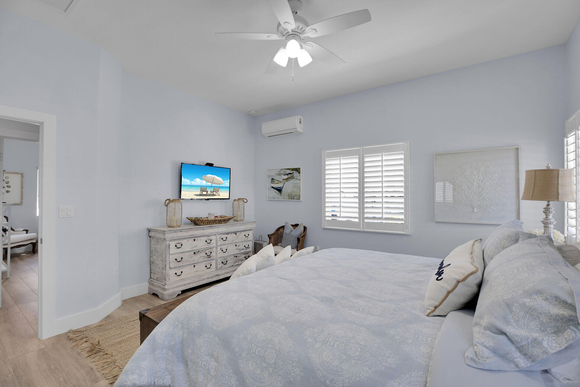 162 Marina Avenue Key Largo, FL 33037 - Photo 27 of 53 a bedroom with a bed and a tv on the dresser