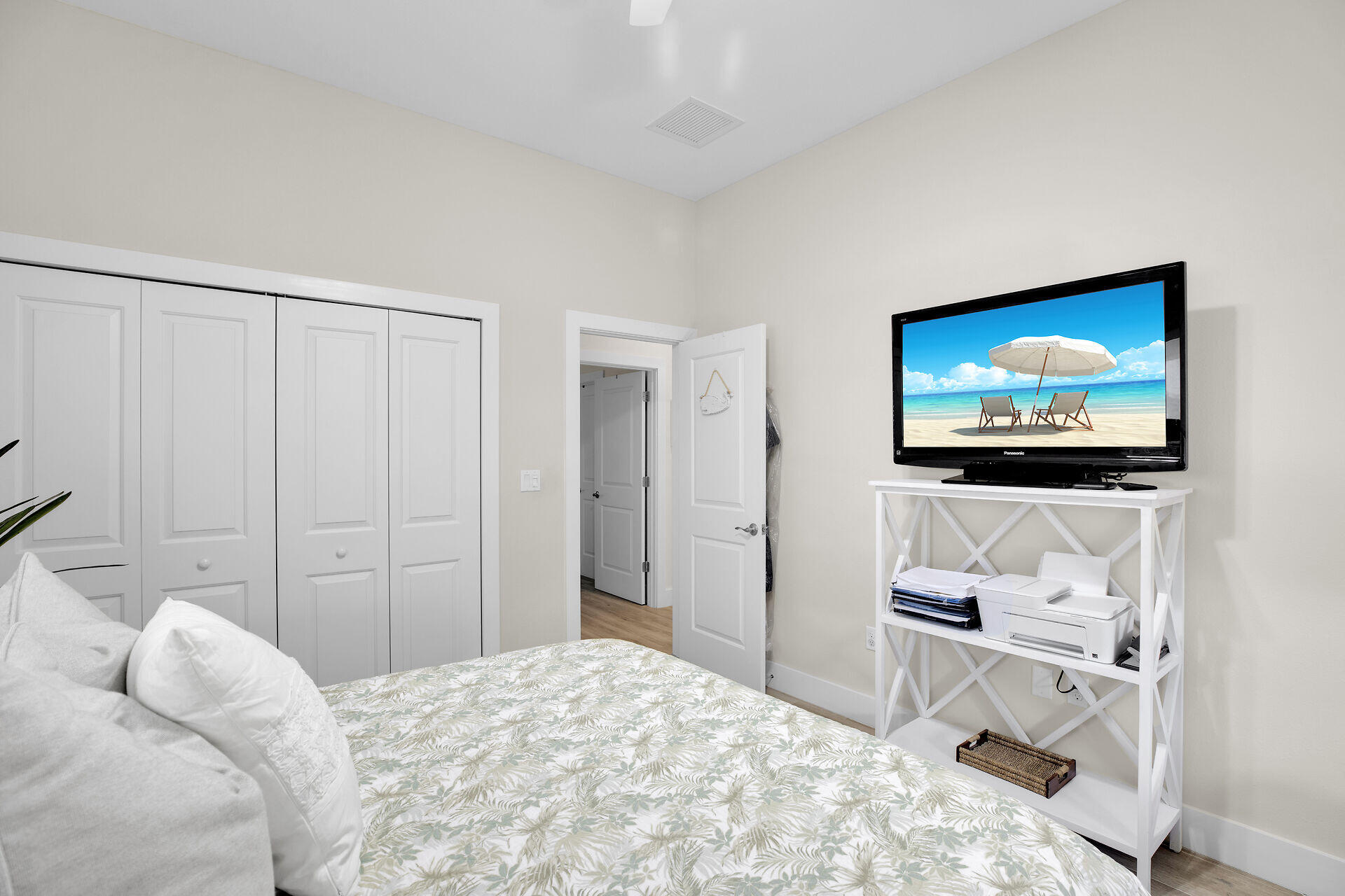 162 Marina Avenue Key Largo, FL 33037 - Photo 31 of 53 a bedroom with a bed and a flat screen tv