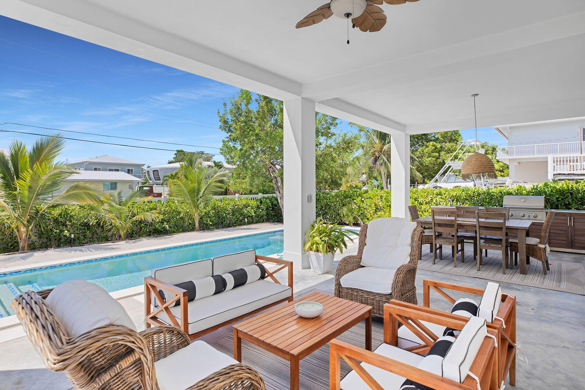 162 Marina Avenue Key Largo, FL 33037 - Photo 38 of 53 a living room with furniture and a large window