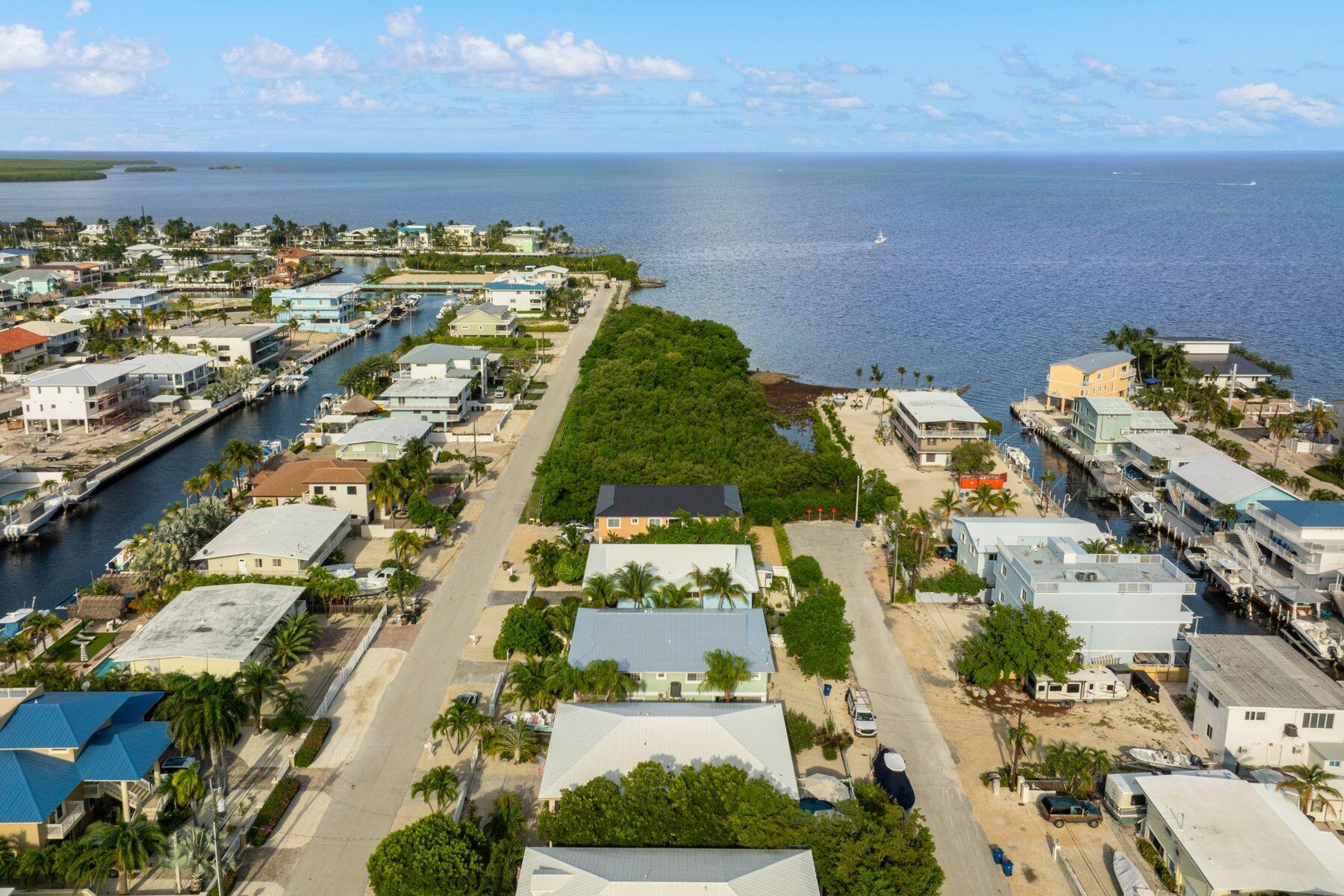162 Marina Avenue Key Largo, FL 33037 - Photo 45 of 53 an aerial view of residential houses with outdoor space
