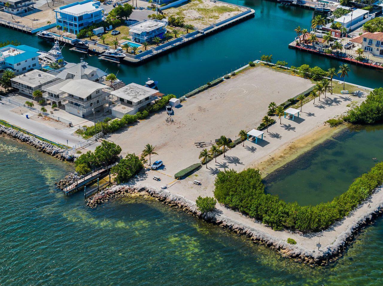 162 Marina Avenue Key Largo, FL 33037 - Photo 53 of 53 an aerial view of a house with a lake view