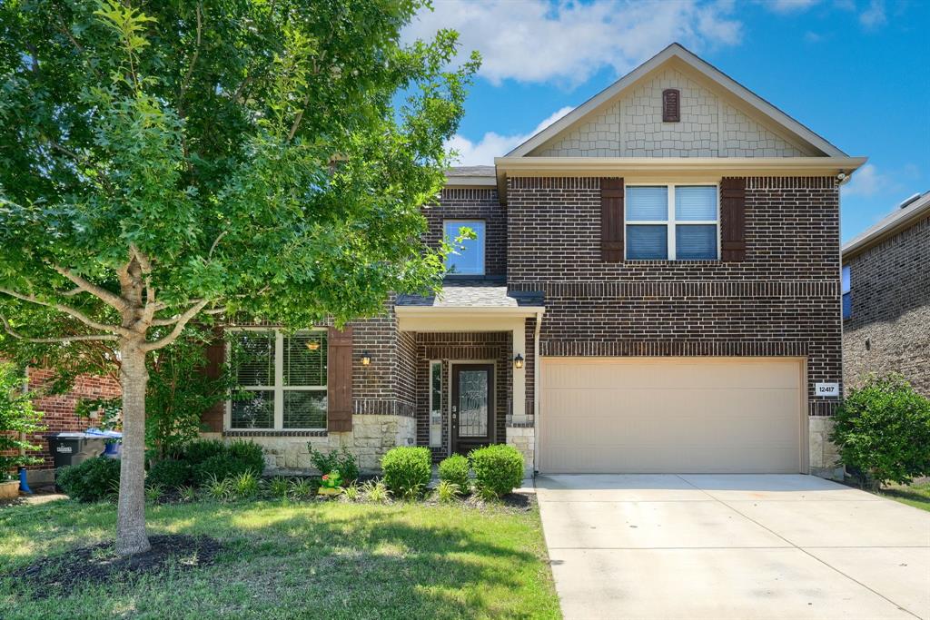 12417 Hitch Rack Way McKinney, TX 75071 - Photo 1 of 17 View of front of property with a garage and a front yard