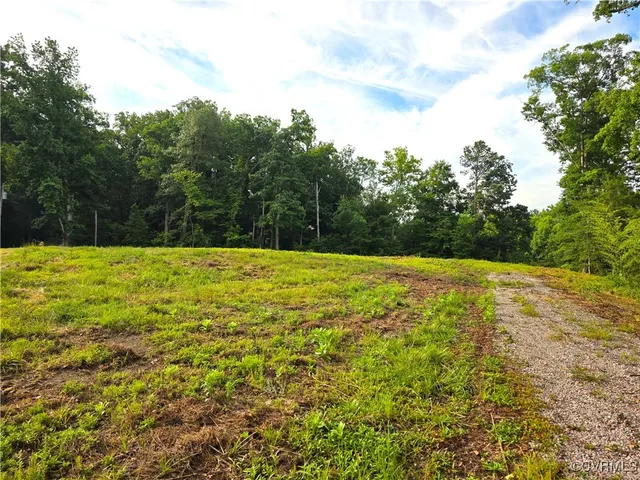a view of a swimming pool with an outdoor space