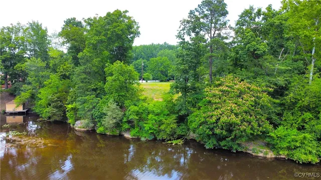a view of a lake view with a garden