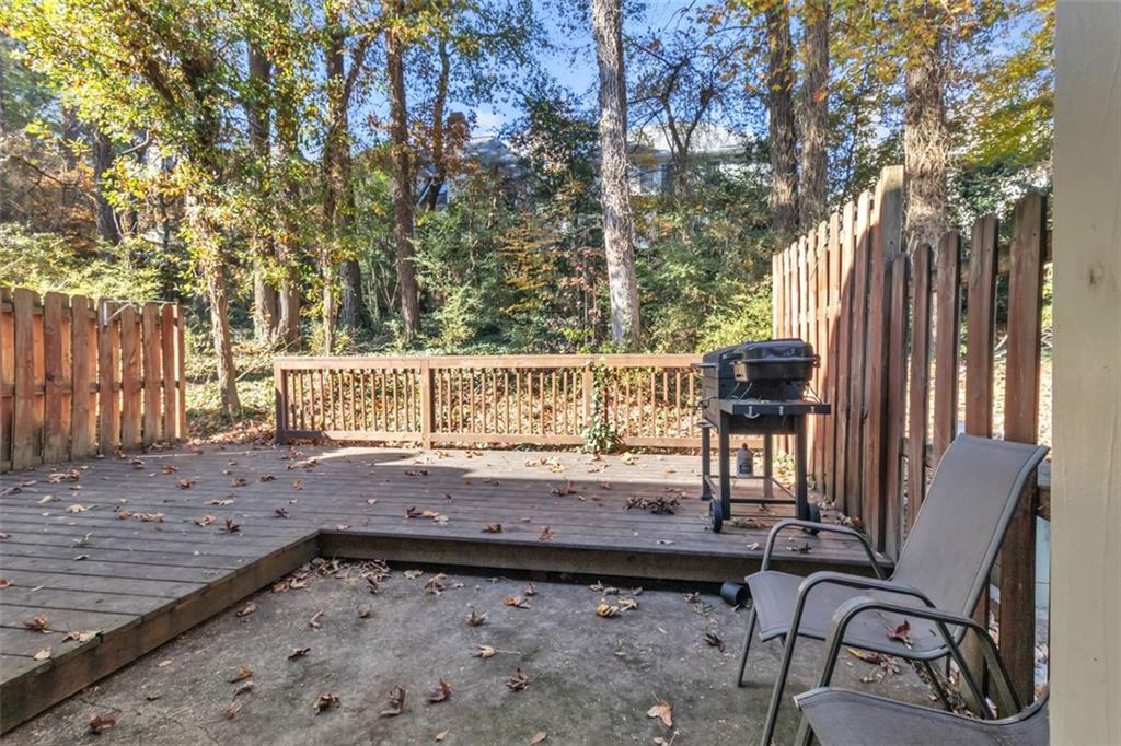 4430 Tilly Mill Road, Unit 206 Atlanta, GA 30360 - Photo 12 of 29 a view of a backyard with a bench
