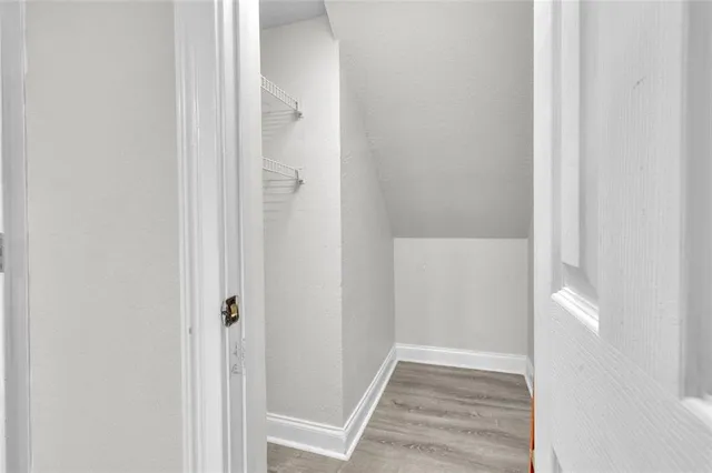 a view of a bathroom from a hallway