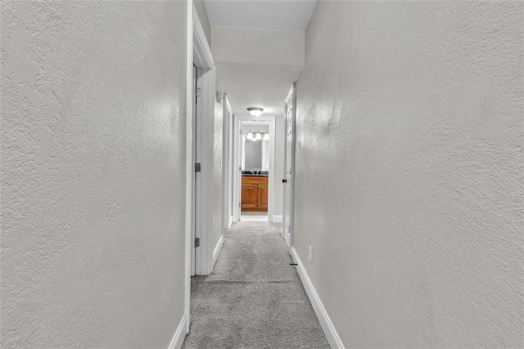 4430 Tilly Mill Road, Unit 206 Atlanta, GA 30360 - Photo 17 of 29 a view of a hallway with wooden floor