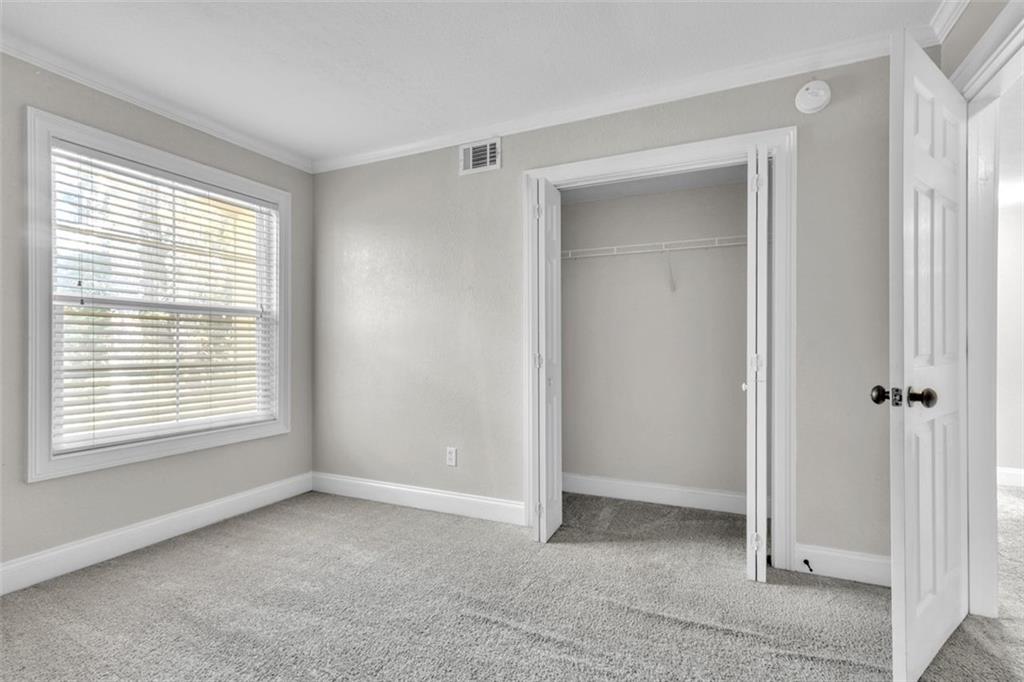 4430 Tilly Mill Road, Unit 206 Atlanta, GA 30360 - Photo 19 of 29 a view of an empty room with a window
