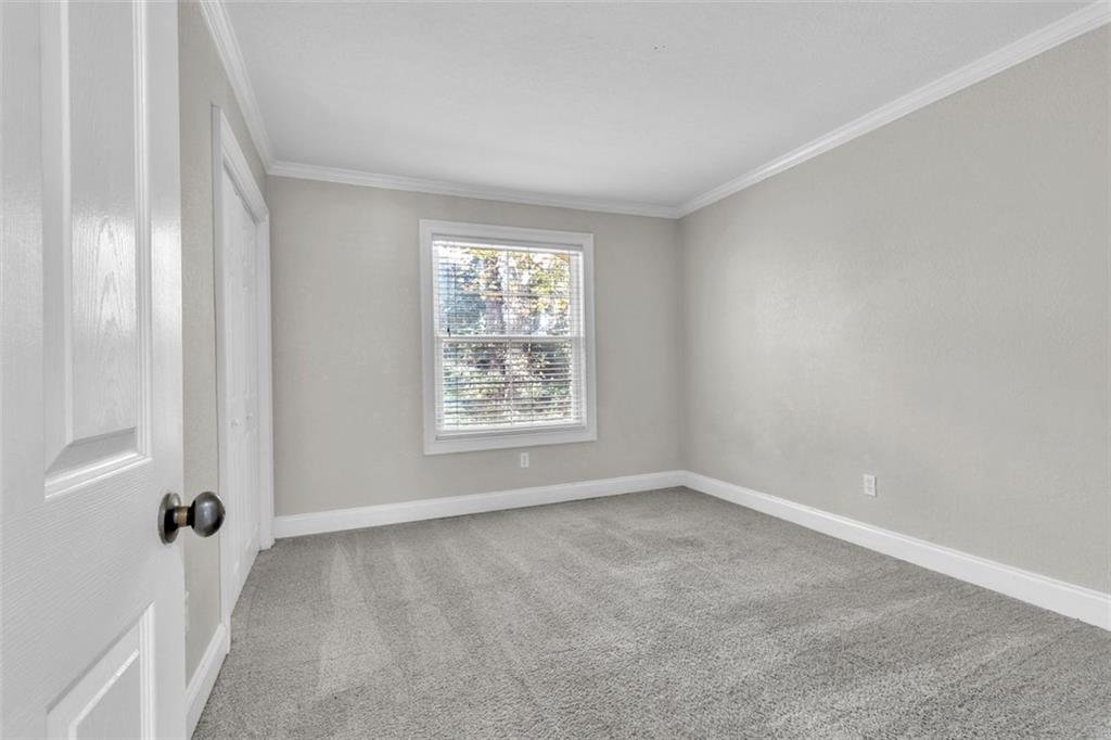 4430 Tilly Mill Road, Unit 206 Atlanta, GA 30360 - Photo 20 of 29 an empty room with windows