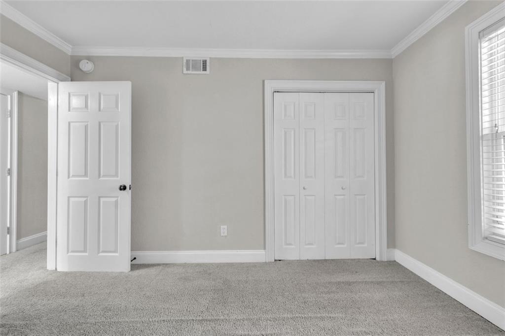 4430 Tilly Mill Road, Unit 206 Atlanta, GA 30360 - Photo 21 of 29 a view of an empty room with windows