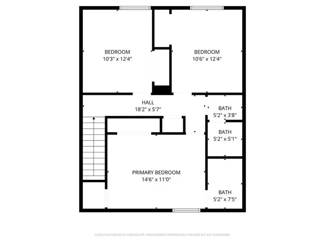 a picture of a bench in front of a wall