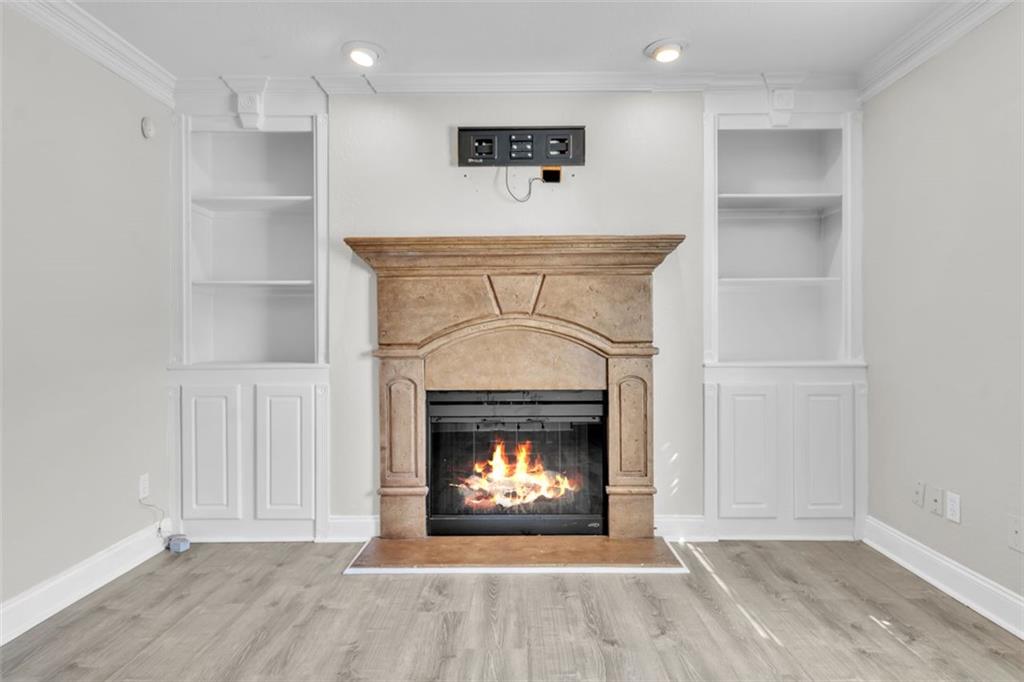 4430 Tilly Mill Road, Unit 206 Atlanta, GA 30360 - Photo 5 of 29 a view of an empty room with a fireplace and a window