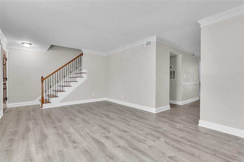 4430 Tilly Mill Road, Unit 206 Atlanta, GA 30360 - Photo 6 of 29 a view of an empty room with wooden floor