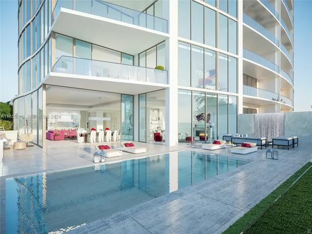 an outdoor view of a building with traffic signal lights