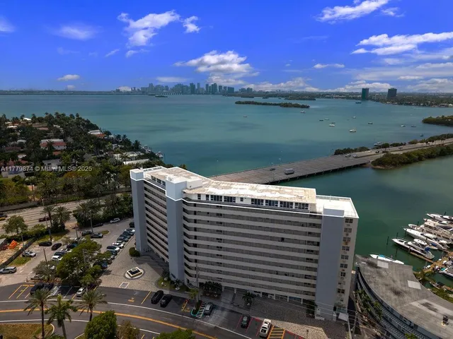 a view of a lake with a city skyline