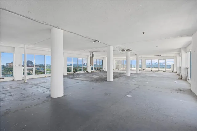 a view of a storage & utility room and window