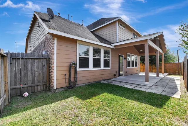 a view of road with large trees