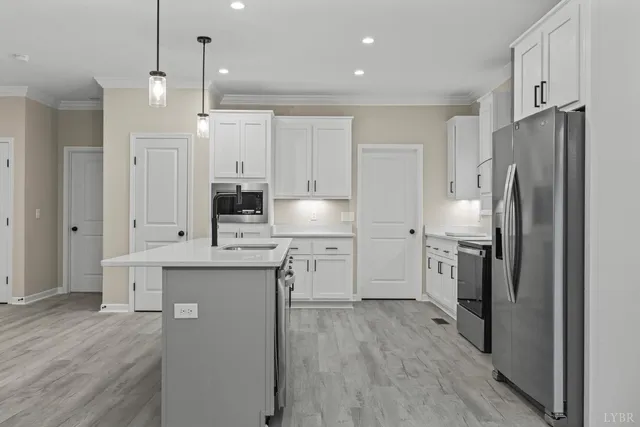 a bathroom with 2 sink and a mirror