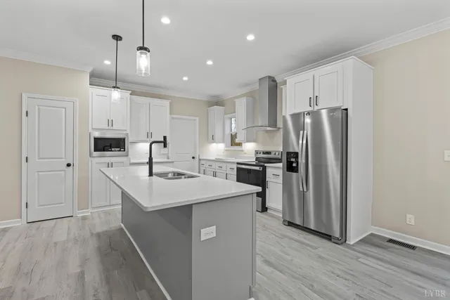 a bathroom with a double vanity sink a mirror and shower