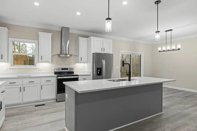 a bathroom with a sink vanity and mirror