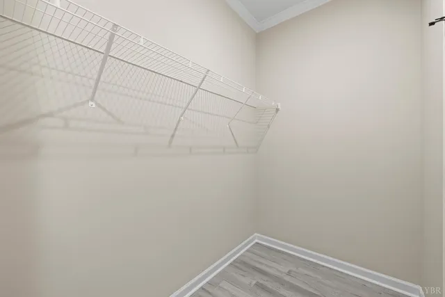 a view of a room with wooden floor and equipment