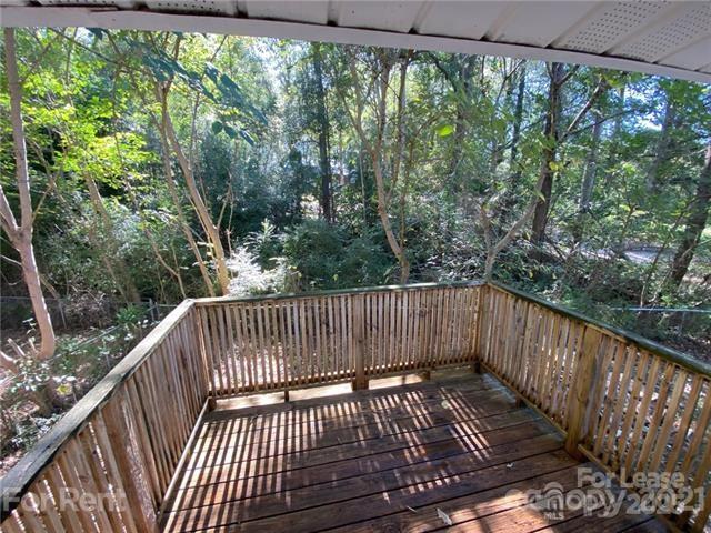 517 West Henry Street Belmont, NC 28012 - Photo 7 of 7 a view of balcony with wooden floor
