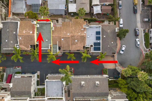 an aerial view of residential houses and outdoor space