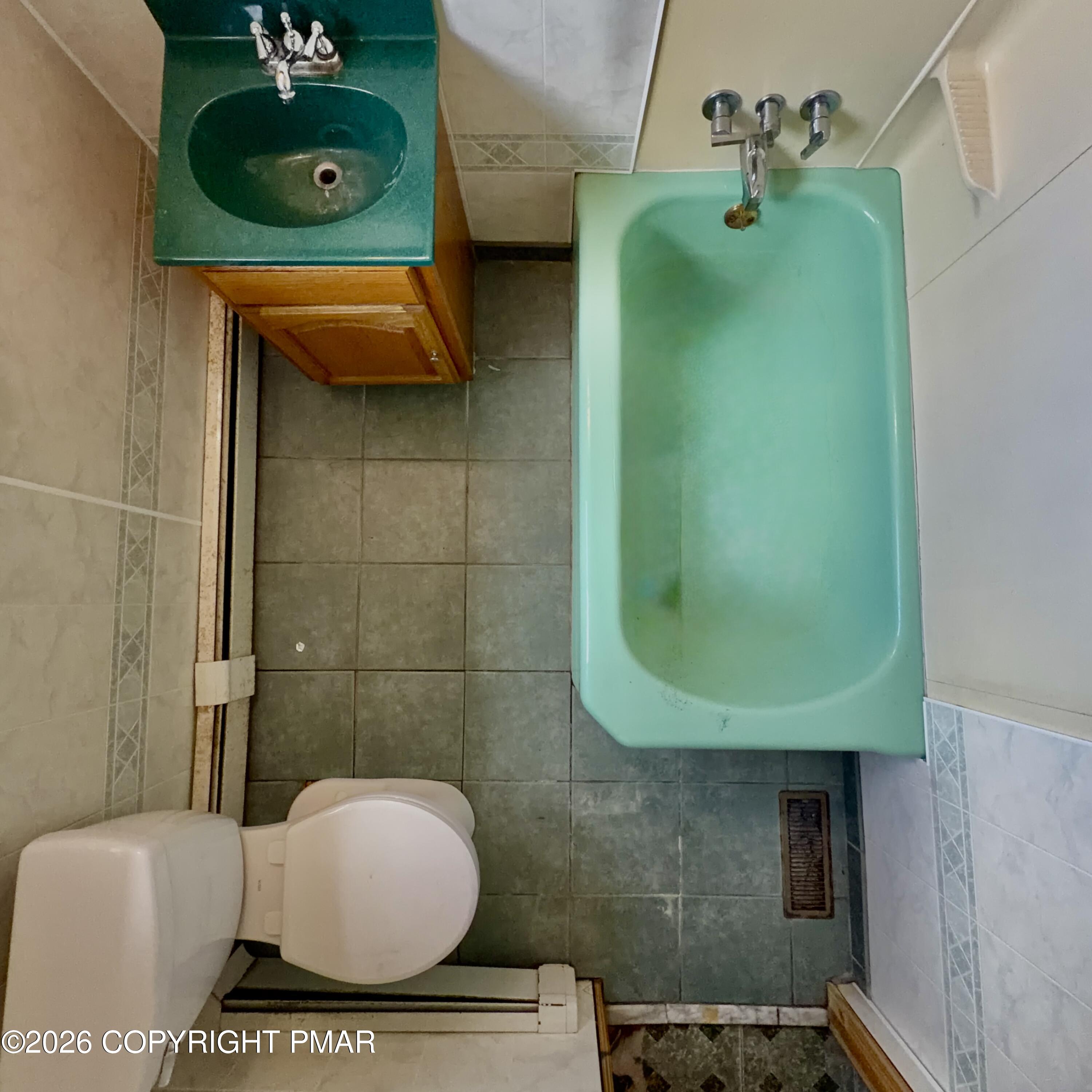 180 Parsonage Street Pittston, PA 18640 - Photo 12 of 19 a bathroom with a toilet and a sink