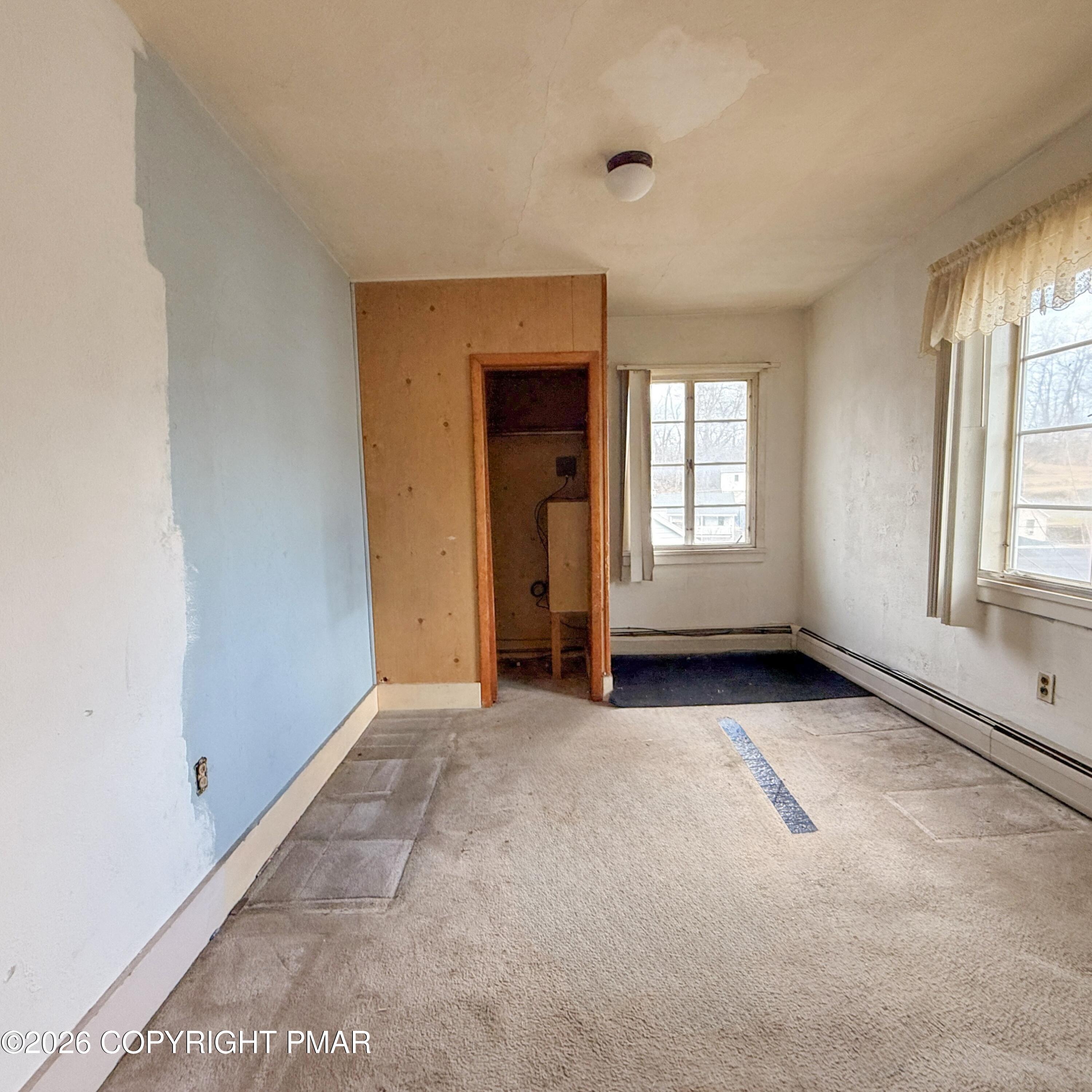 180 Parsonage Street Pittston, PA 18640 - Photo 13 of 19 an empty room with windows and closet