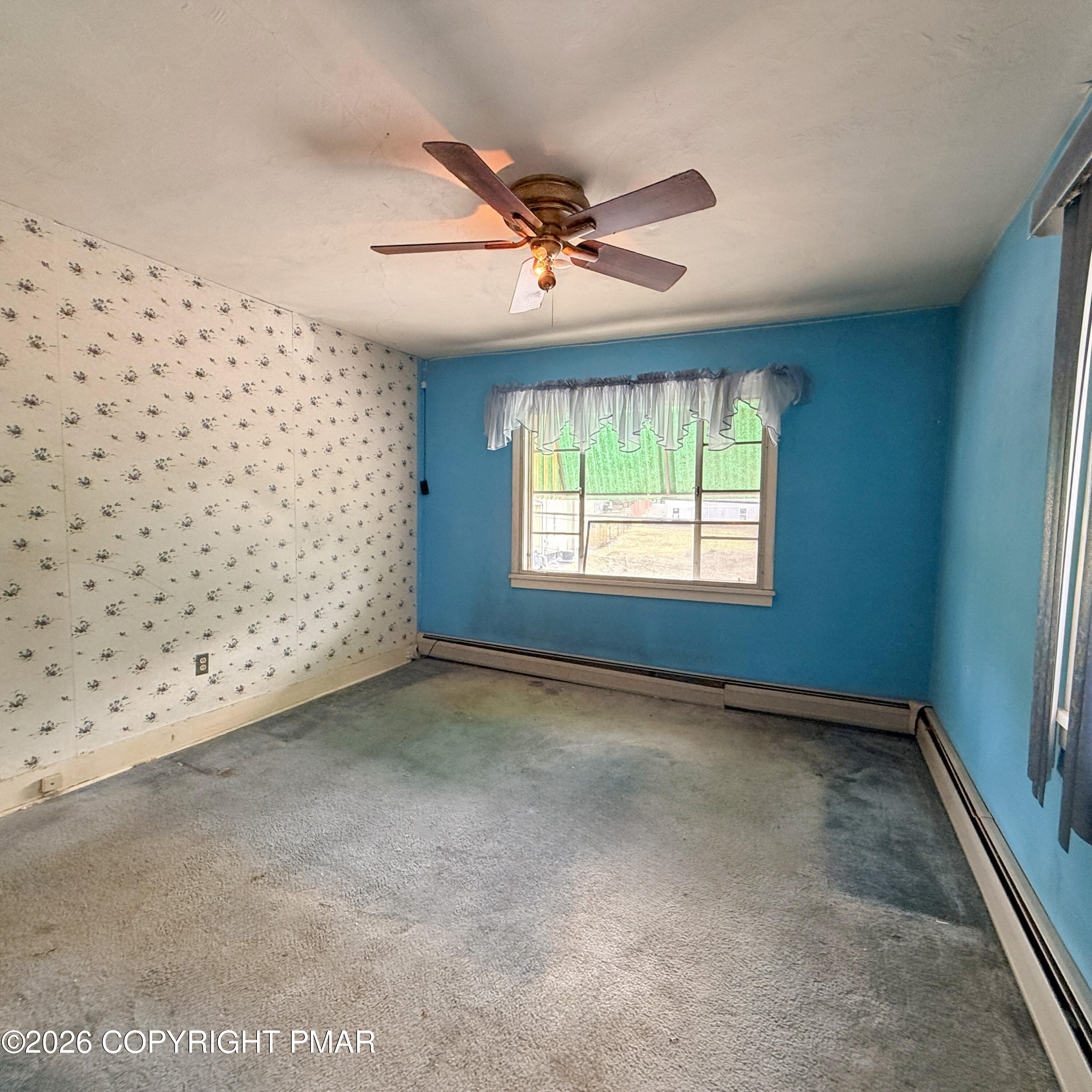 180 Parsonage Street Pittston, PA 18640 - Photo 15 of 19 a view of an empty room with a window