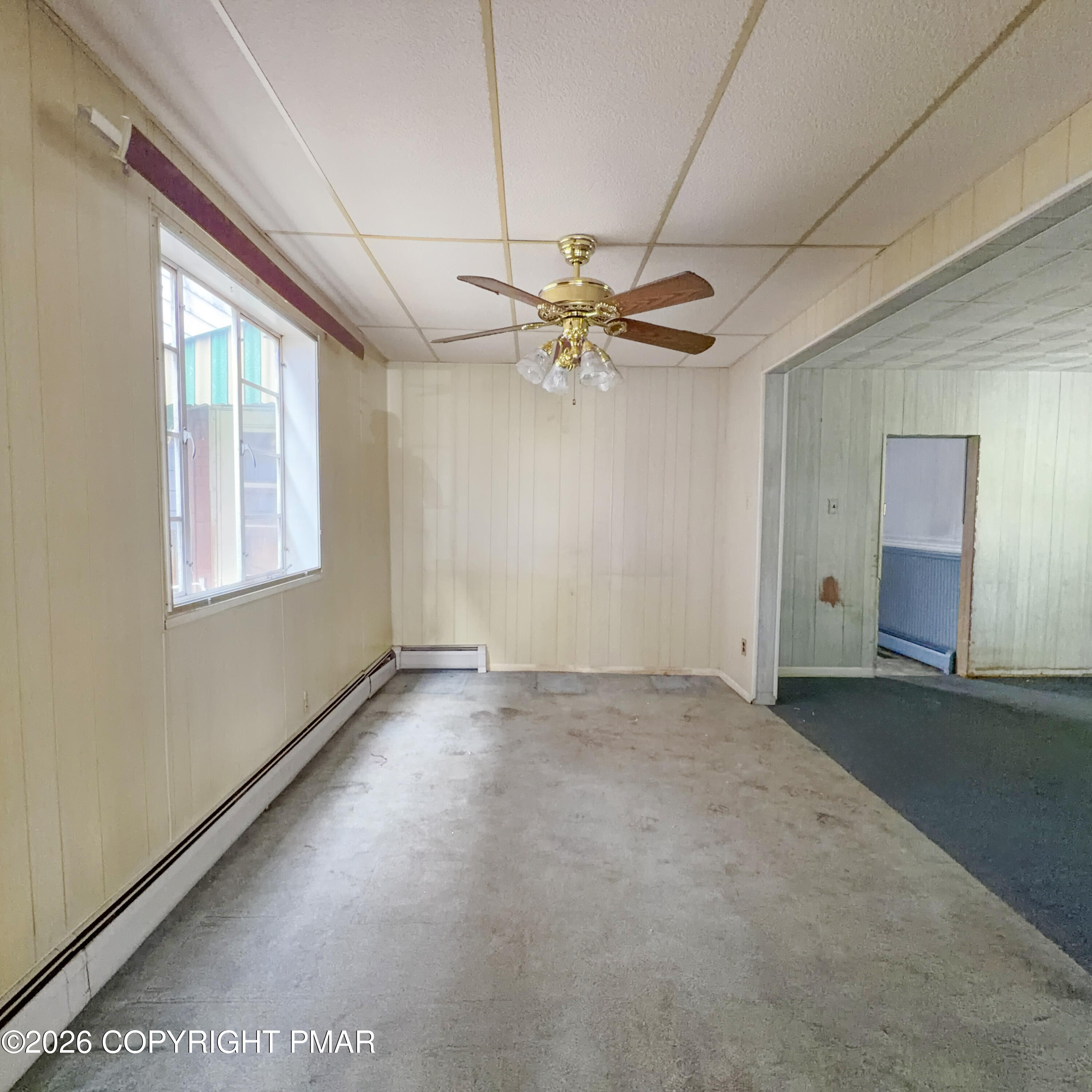 180 Parsonage Street Pittston, PA 18640 - Photo 7 of 19 an empty room with fan and windows