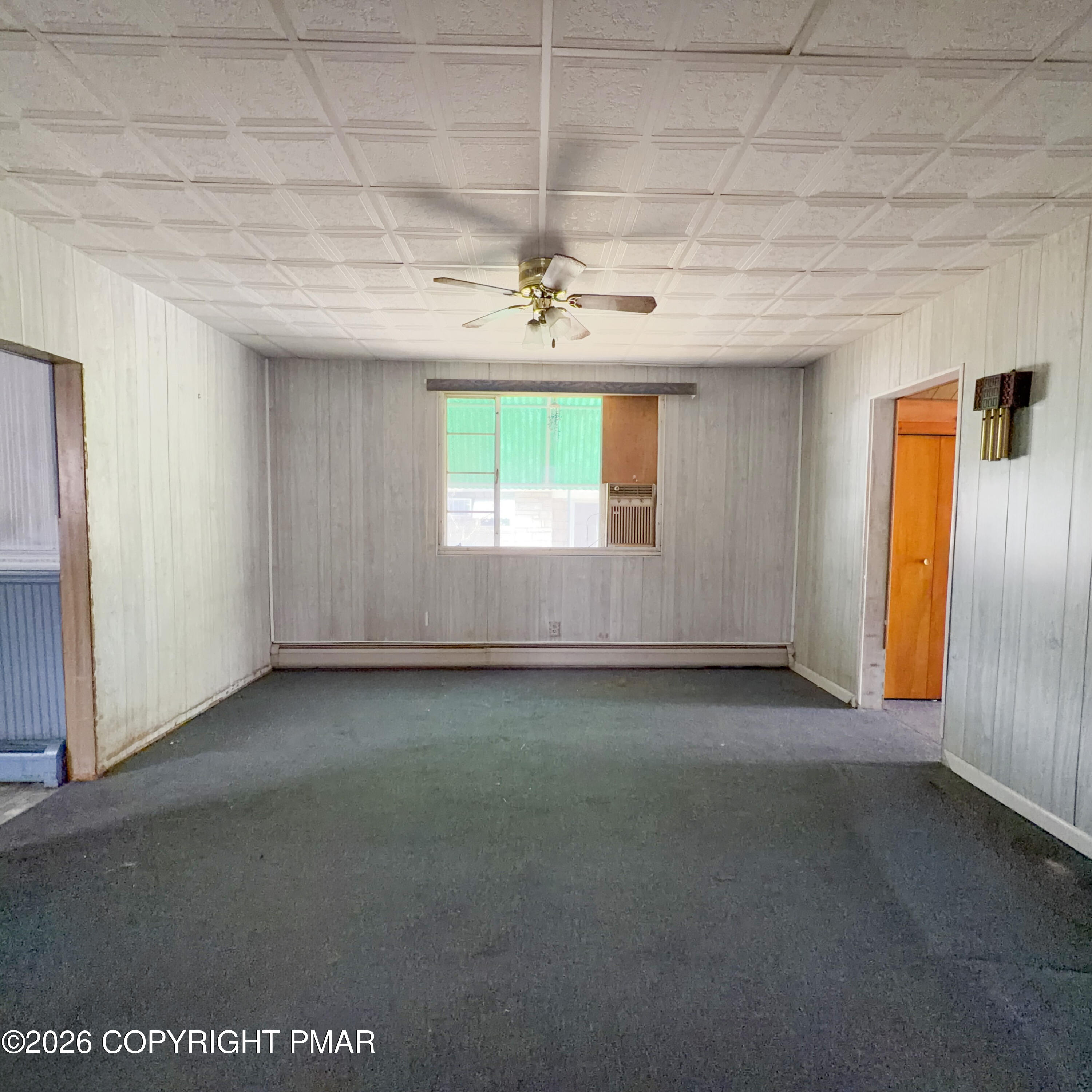 180 Parsonage Street Pittston, PA 18640 - Photo 8 of 19 an empty room with windows