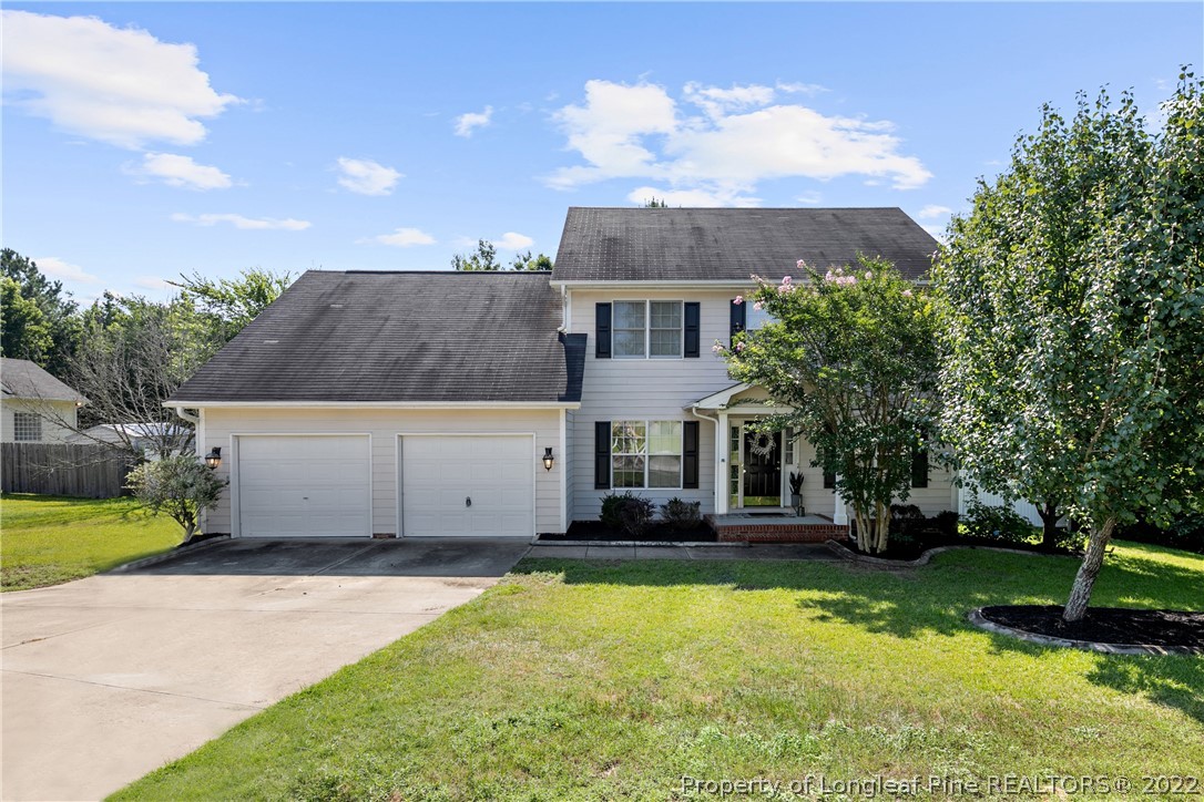 5823 Spreading Branch Road Hope Mills, NC 28348 - Photo 1 of 49 front view of a house with a yard