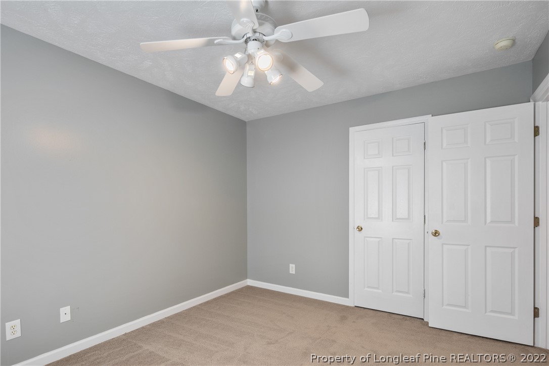 5823 Spreading Branch Road Hope Mills, NC 28348 - Photo 32 of 49 wooden floor in an empty room