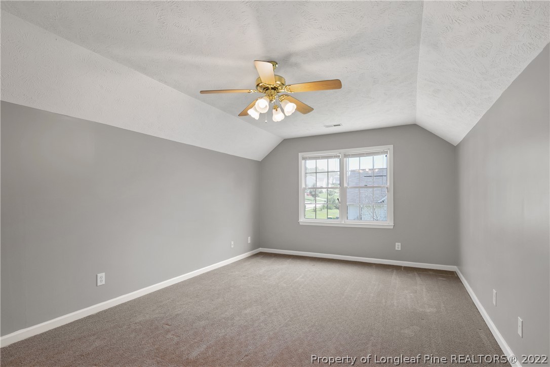 5823 Spreading Branch Road Hope Mills, NC 28348 - Photo 43 of 49 a view of a room with a window and a fan