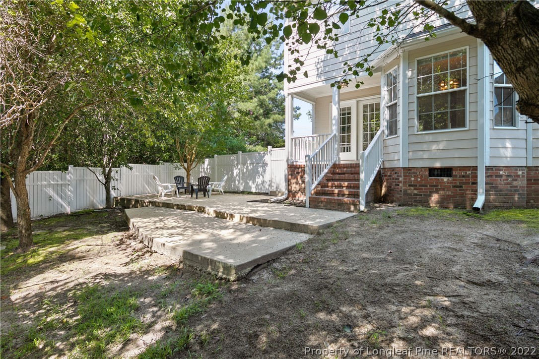 5823 Spreading Branch Road Hope Mills, NC 28348 - Photo 48 of 49 a view of a house with a yard
