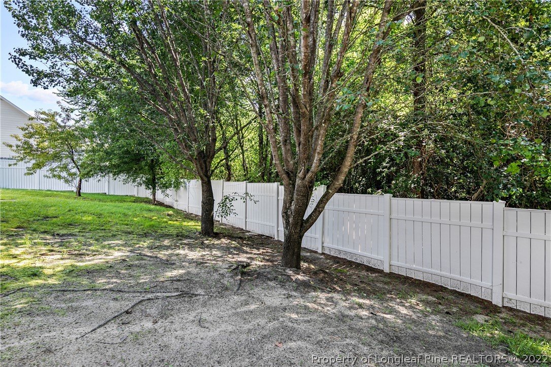 5823 Spreading Branch Road Hope Mills, NC 28348 - Photo 49 of 49 a view of a yard with a tree