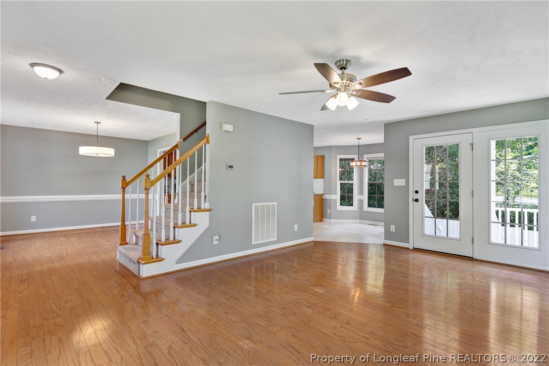 5823 Spreading Branch Road Hope Mills, NC 28348 - Photo 10 of 49 a view of an entryway with wooden floor