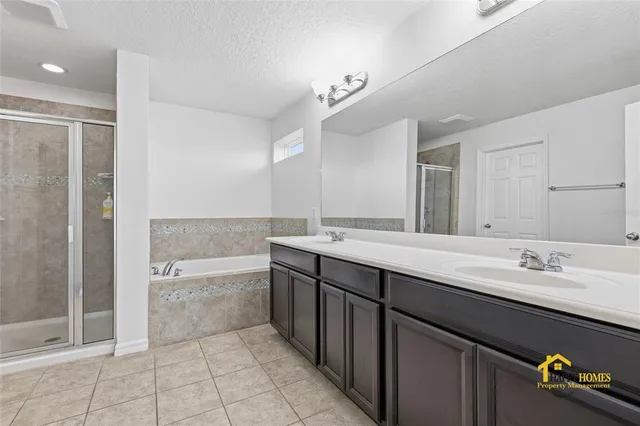 a bathroom with a shower and a toilet