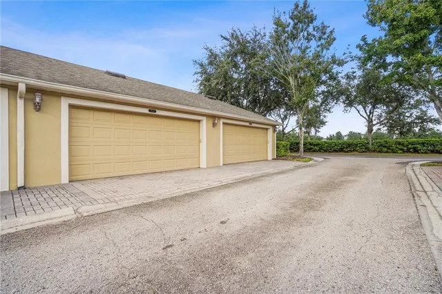 a view of garage and yard