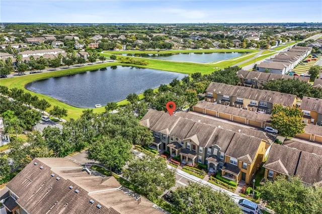 an aerial view of a house with a garden