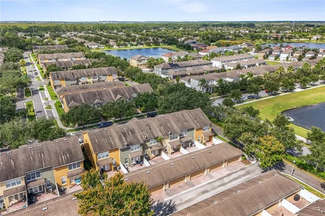 an aerial view of a house with a garden