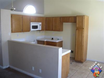 11544 Spring Street Adelanto, CA 92301 - Photo 4 of 15 a utility room with washer and dryer