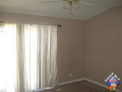 11544 Spring Street Adelanto, CA 92301 - Photo 9 of 15 a very nice looking room with a window