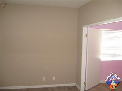 11544 Spring Street Adelanto, CA 92301 - Photo 10 of 15 a view of a room with toys